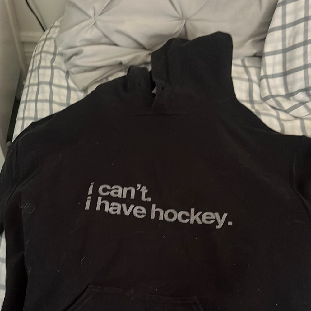 Black Hoodie with 'I can't. I have hockey.' Print